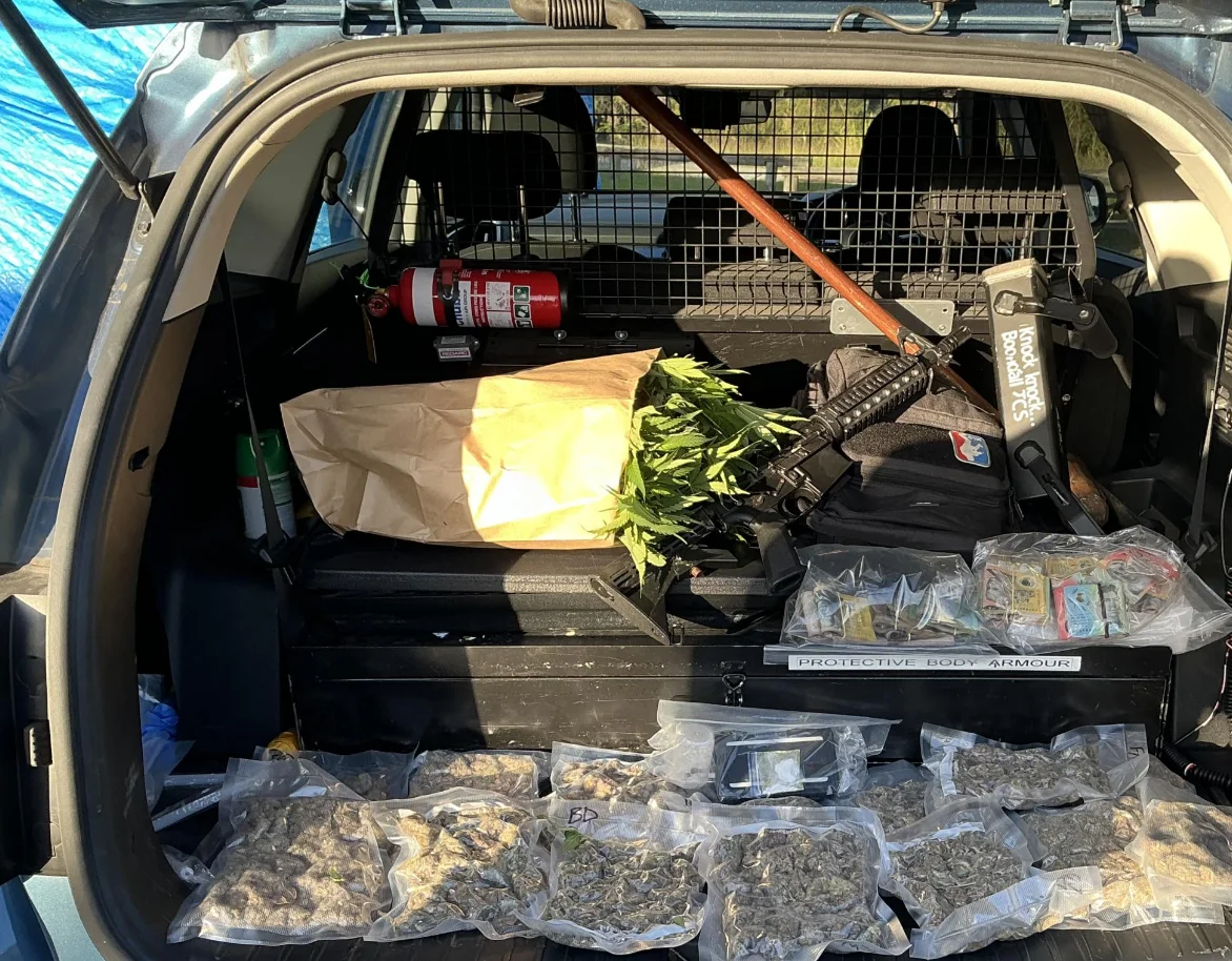 Seized drugs beside alleged drug cash